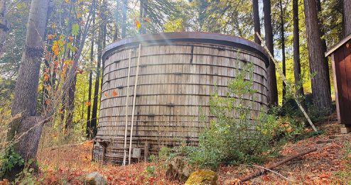 A Lake Canyon water tank among the trees