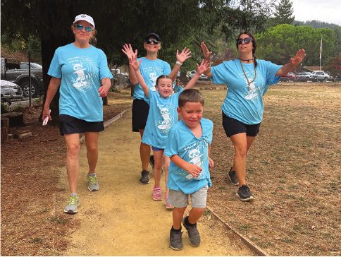Students running laps at the walk-a-thon
