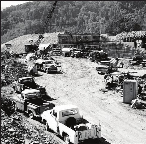 Earth-moving equipment building the Newell Creek dam